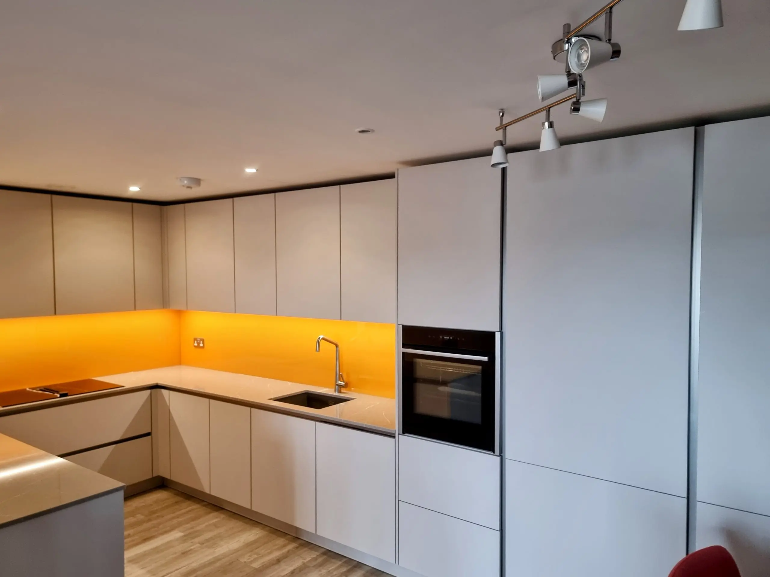 Nobilia white matt modern handleless kitchen designed and installed by Victoria Kitchens, Greenwich, SE London