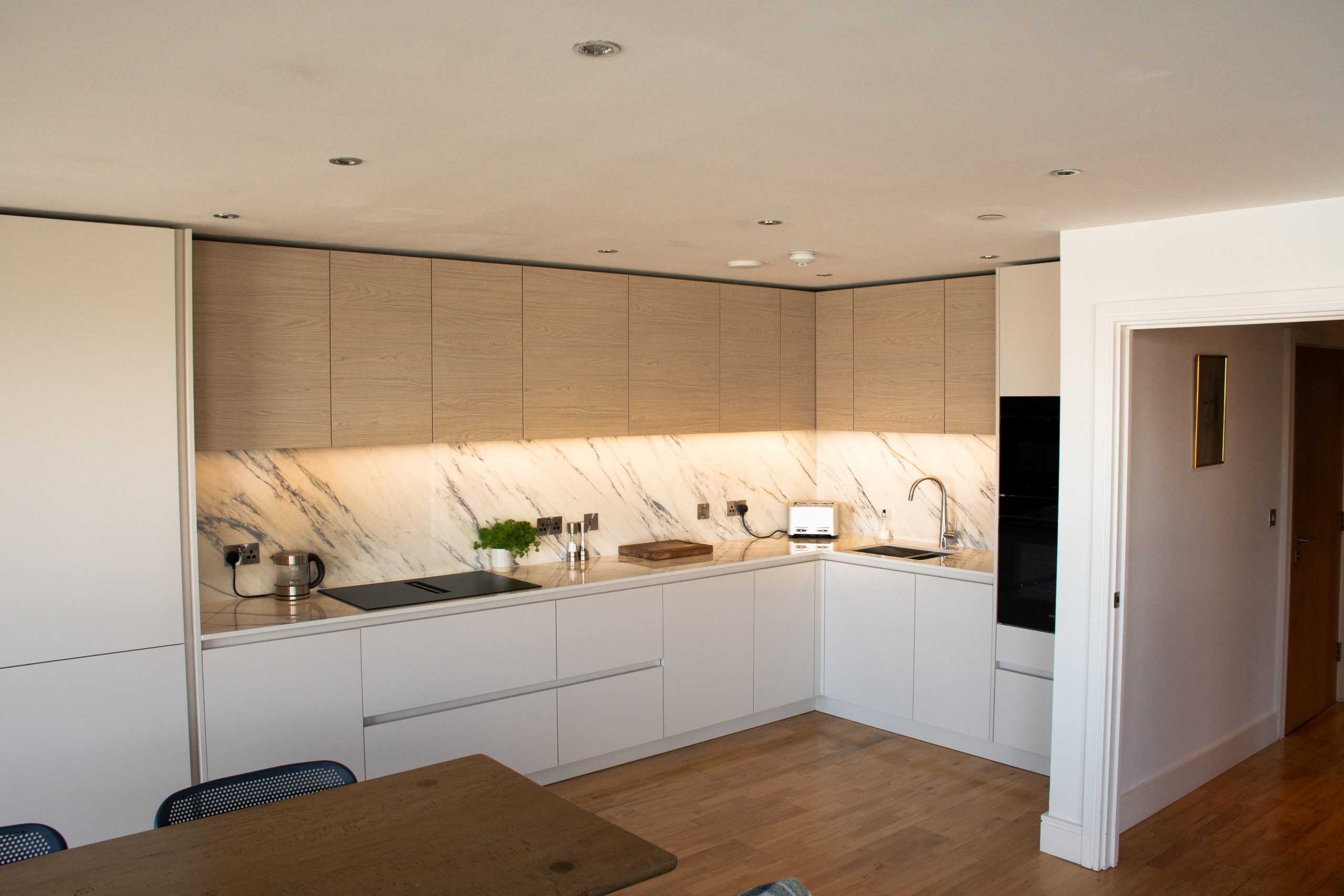 Rotpunkt white handleless kitchen designed and installed in Greenwich, SE London