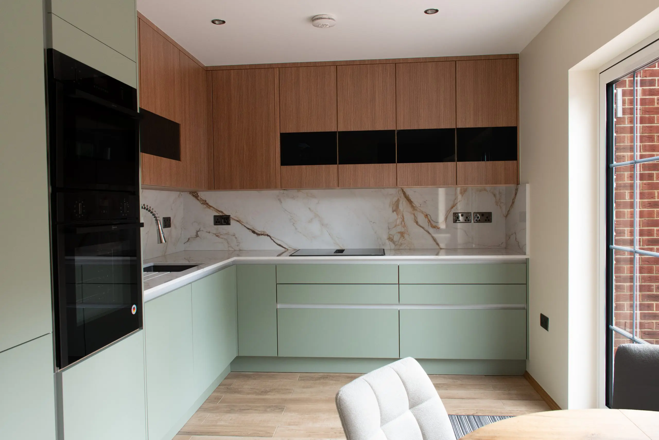 Victoria Kitchens own range modern handleless kitchen designed and installed in SE London
