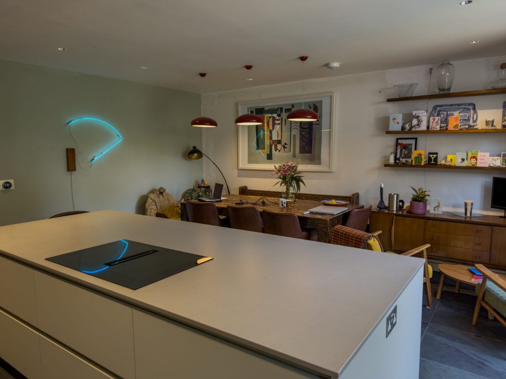 Rotpunkt kitchen island with integrated hob, Kashmir Matt cabinetry, Victoria Kitchens