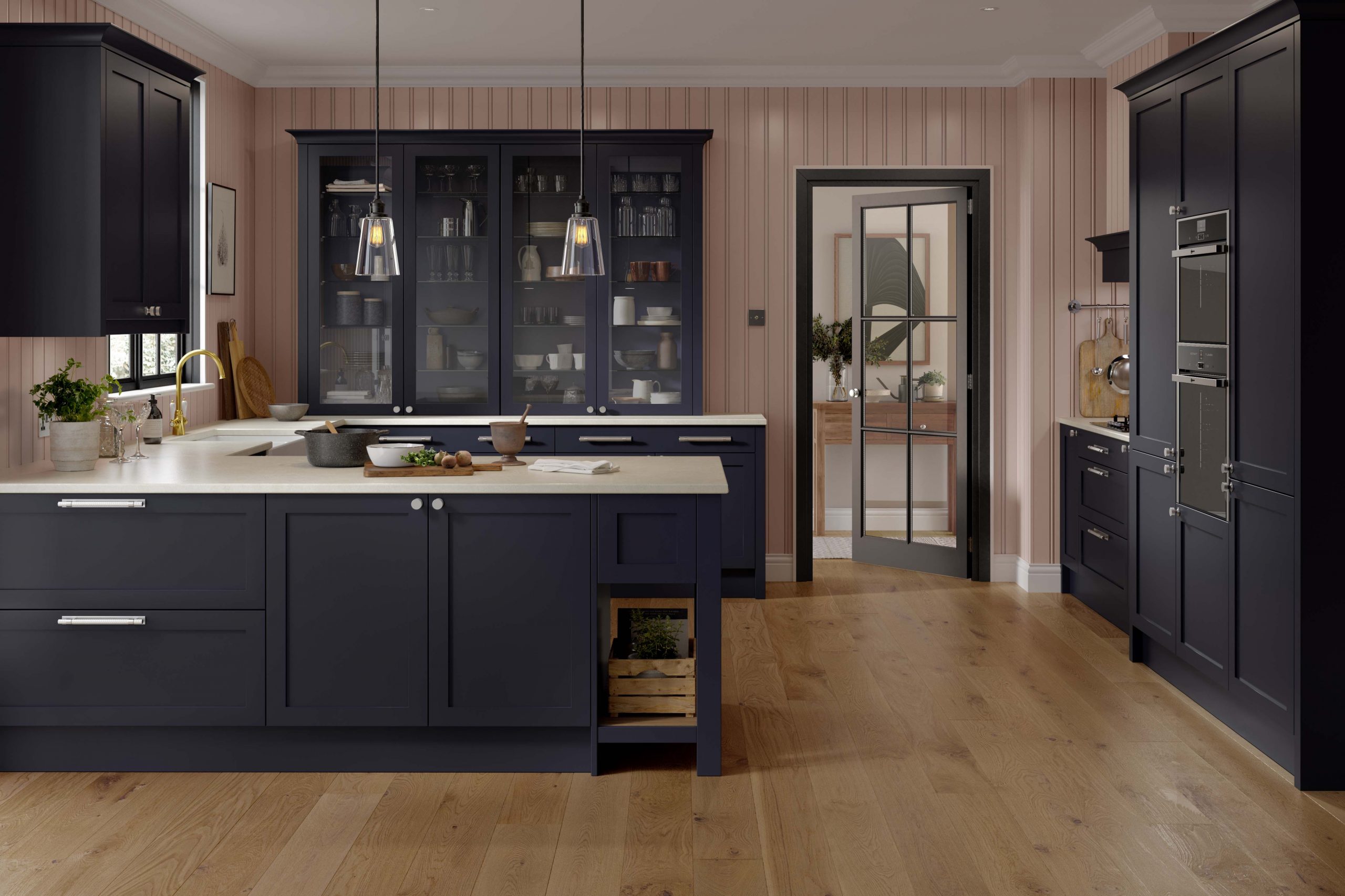 Luxury in-frame Shaker kitchen in soft sage with marble worktop, designed and installed by Victoria Kitchens in South East London